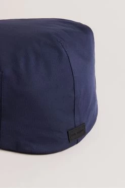 Ted Baker Blue Water Resistant Nylon Flat Cap 8 Ted Baker Blue Water Resistant Nylon Flat Cap -Ted Baker Shop D57149s3