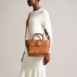 Ted Baker JIMSA Tan Faux Leather Knot Bow Crossbody Bag 12 Ted Baker JIMSA Tan Faux Leather Knot Bow Crossbody Bag -Ted Baker Shop ted baker 260650 tan jimsa tan faux leather bow crossbody bag lifestyle 1
