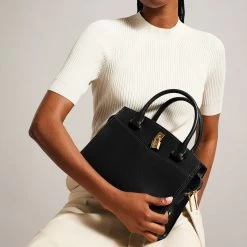 Ted Baker MYFAIR Black Leather Padlock Medium Handbag 13 Ted Baker MYFAIR Black Leather Padlock Medium Handbag -Ted Baker Shop ted baker 274062 black myfair black medium padlock bag lifestyle 1